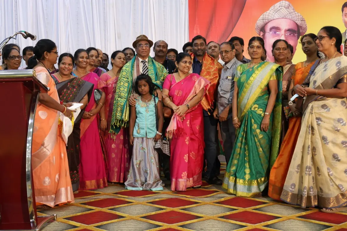Volunteers and beneficiaries gathered at a NAMO GOD Charitable Trust event